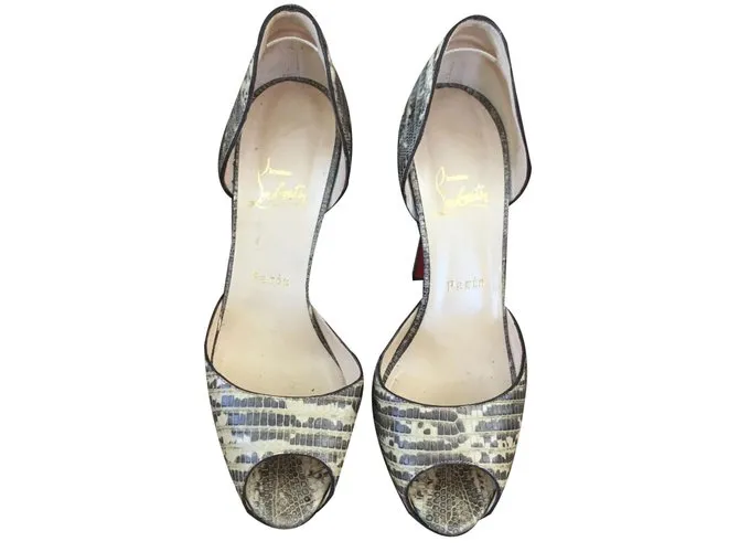 Christian Louboutin Tacones Impresión de pitón 