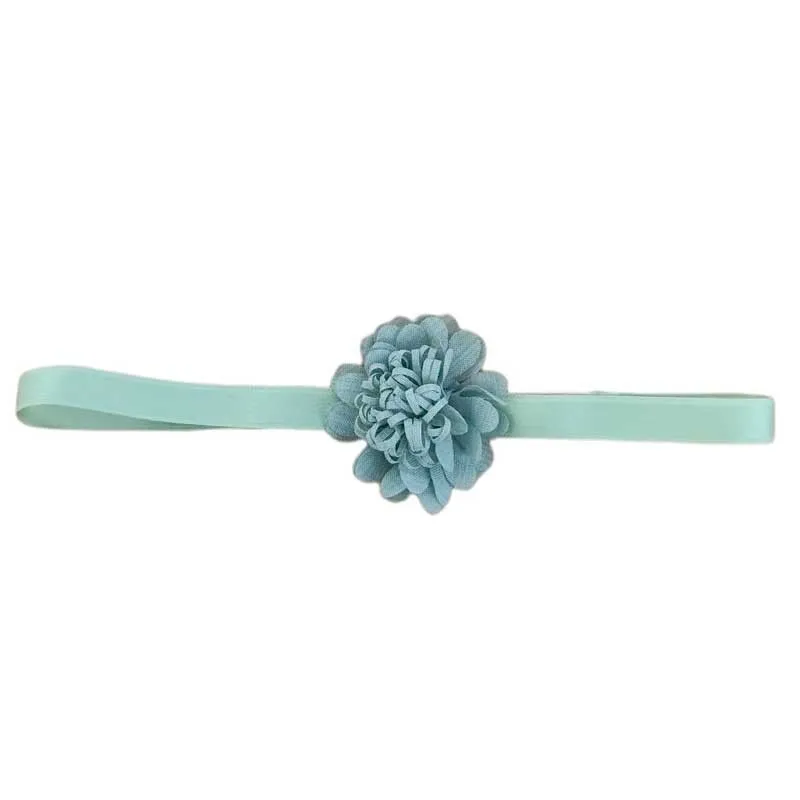 Cinta pelo bebé verde con flor de Azul y Rosa