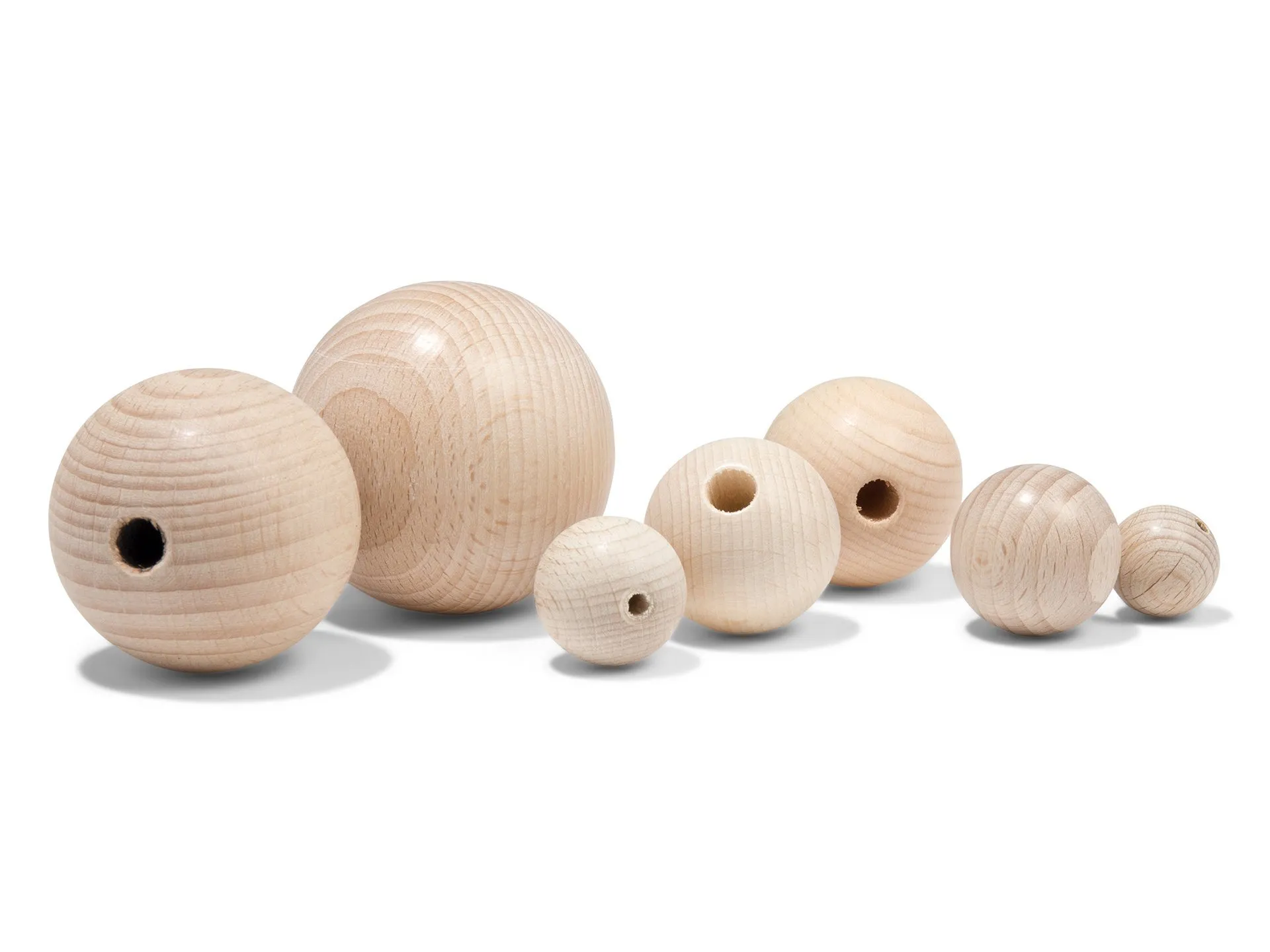 Esfera de madera de haya, semiperforada, en bruto