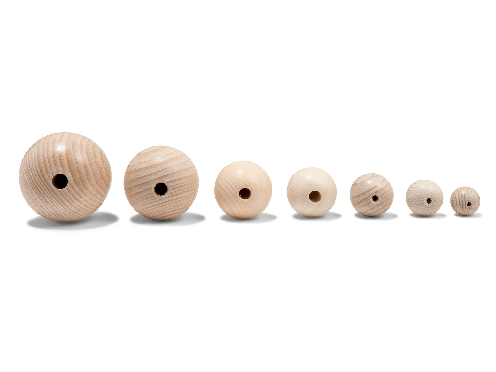 Esfera de madera de haya, semiperforada, en bruto