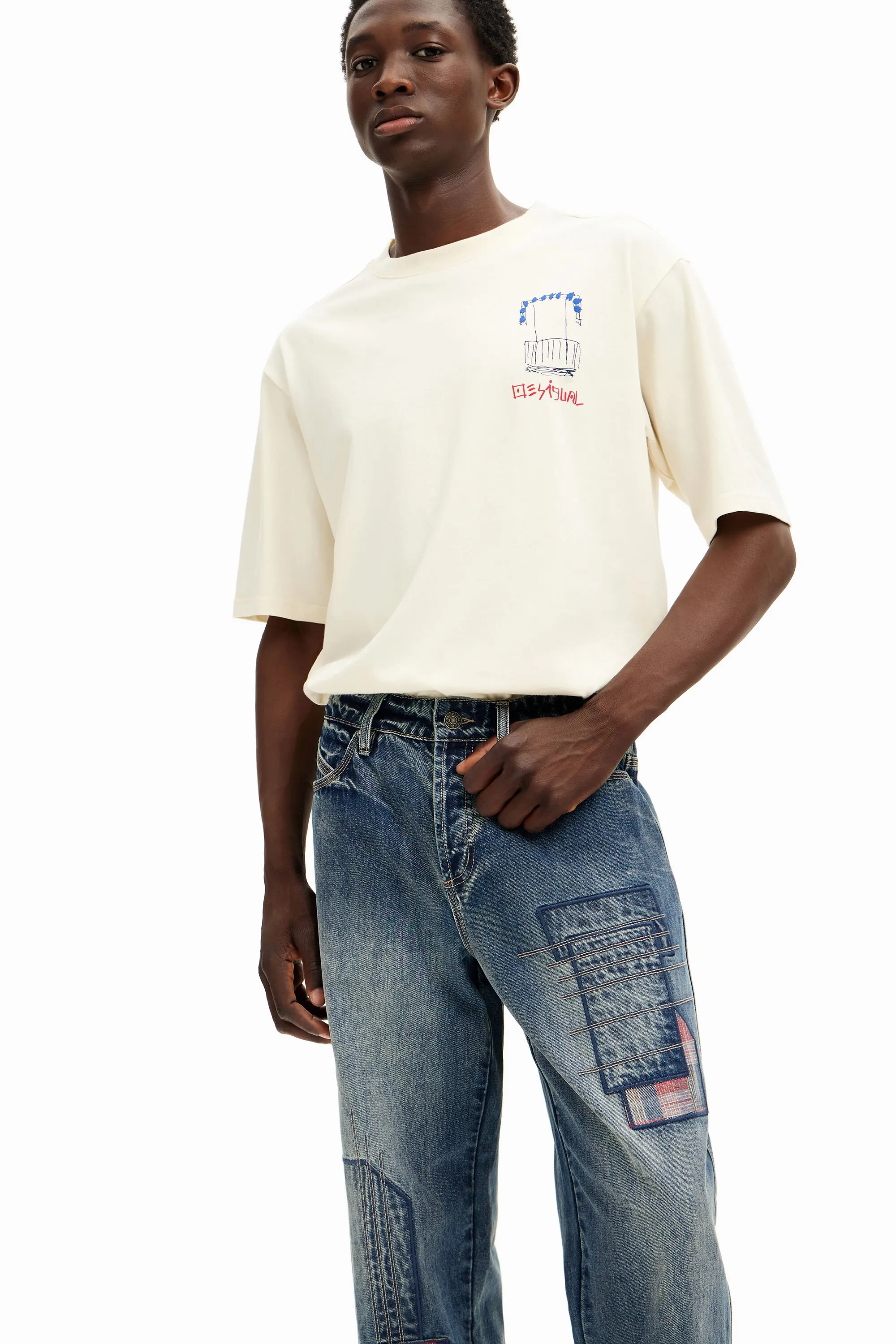 Pantalón denim parcheado