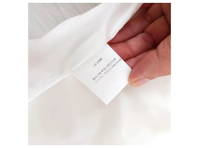 Pantalones palazzo blancos de Georges Rech 