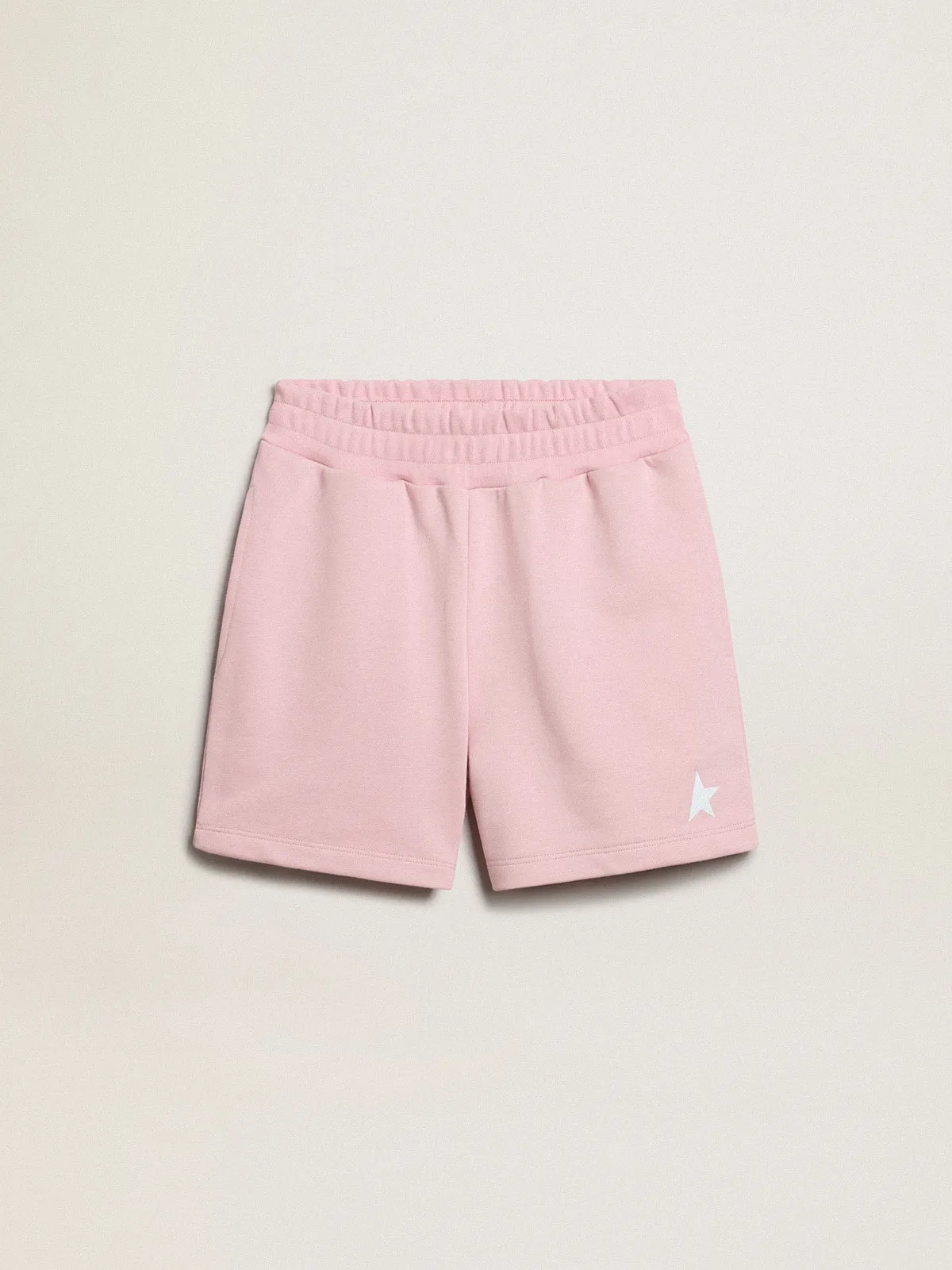 Pantalón corto de niña de color rosa con estrella blanca