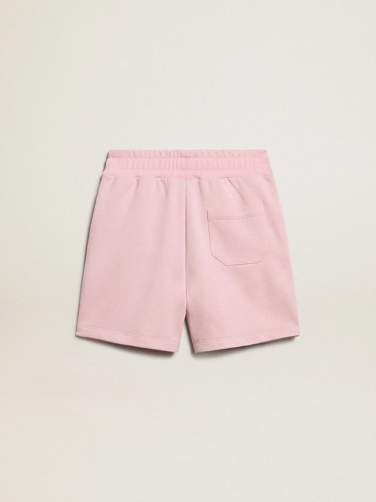 Pantalón corto de niña de color rosa con estrella blanca